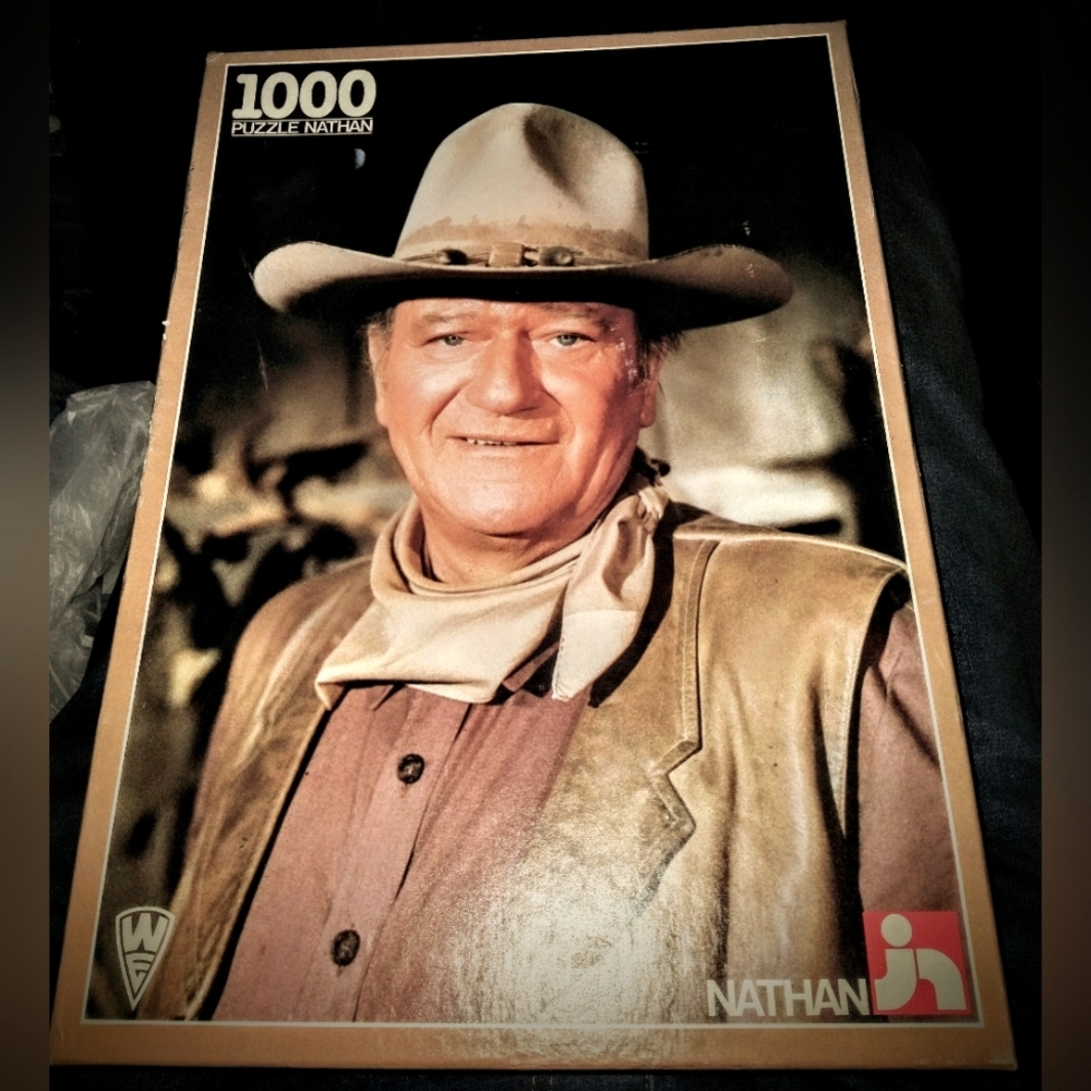 John Wayne Nathan puzzle.box is open.puzzle has never been opened
